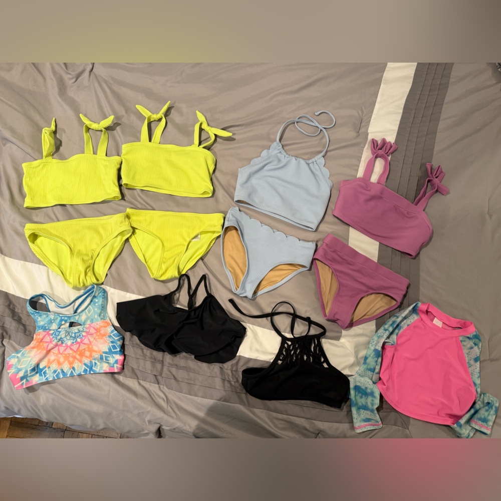 4 girls bathing suits (bikinis) plus 3 tops and a rash guard